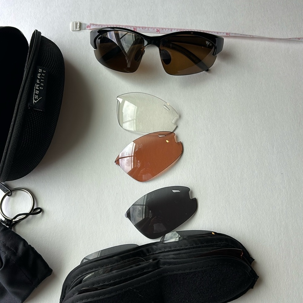 Women's biking glasses w interchangeable lenses.
